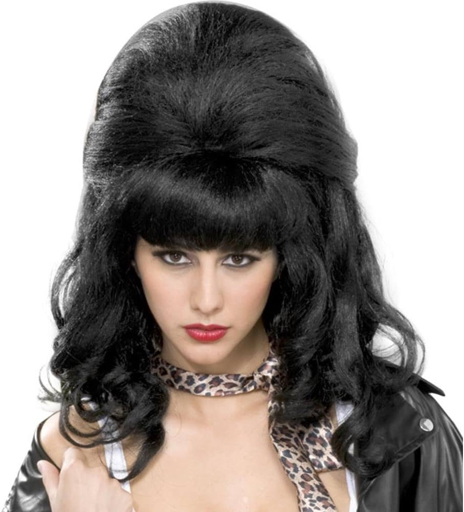 A evolução do estilo de cabelo de Amy Winehouse: do natural ao artificial