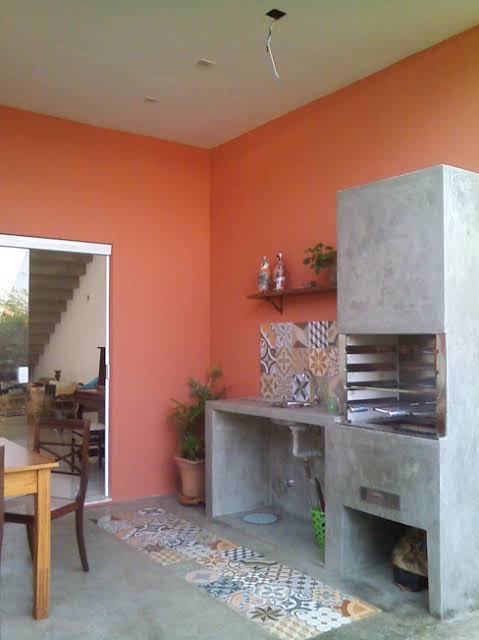 Cozinha terracota com tijolinho