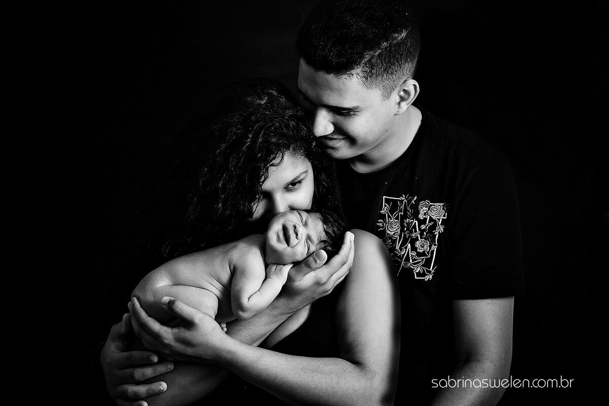 legenda de foto de família com bebê recém nascido