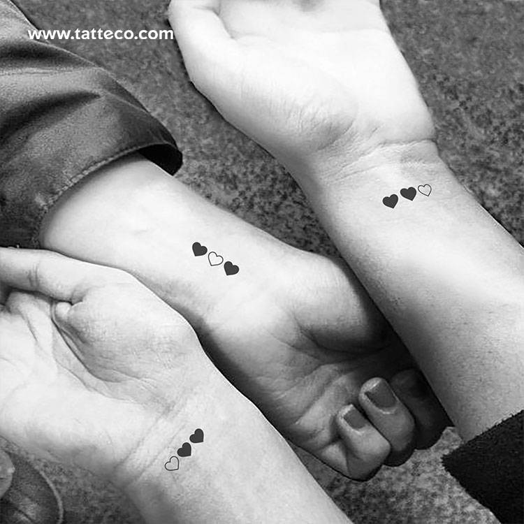 ideias de tatuagem 3 corações feminina